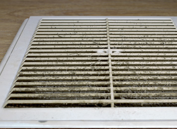 a dirty air duct that needs professional air duct cleaning services