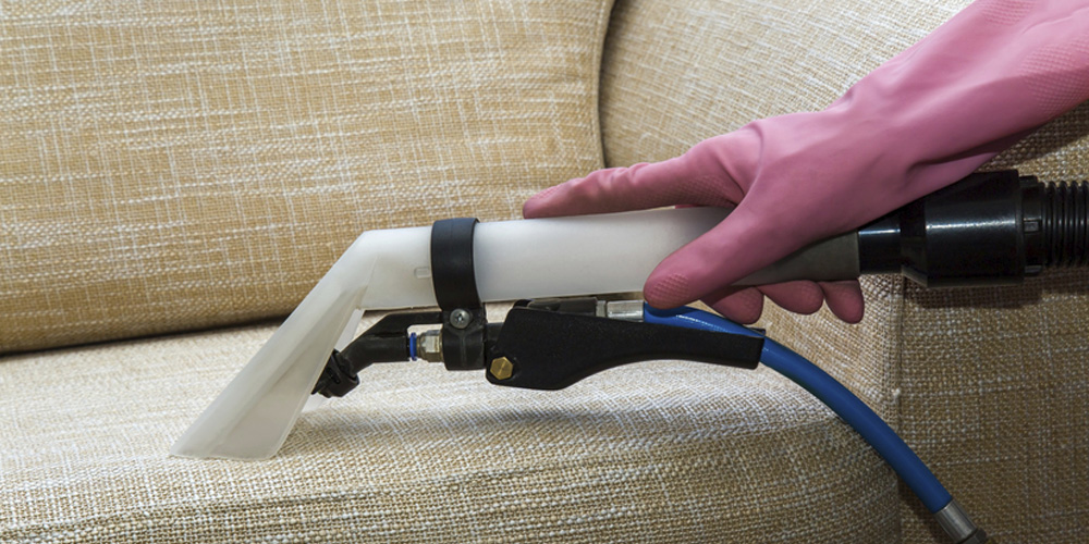 steam-cleaning upholstery with a commercial upholstery cleaning vacuum